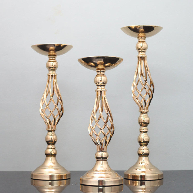 Candelabro giratorio con adornos de jarrón de hierro forjado