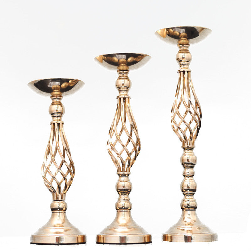 Candelabro giratorio con adornos de jarrón de hierro forjado