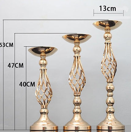 Candelabro giratorio con adornos de jarrón de hierro forjado