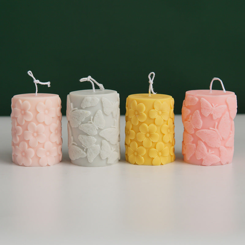 Zylindrische Kerzenform mit Pflaumenblüten- oder Schmetterlingsprägung