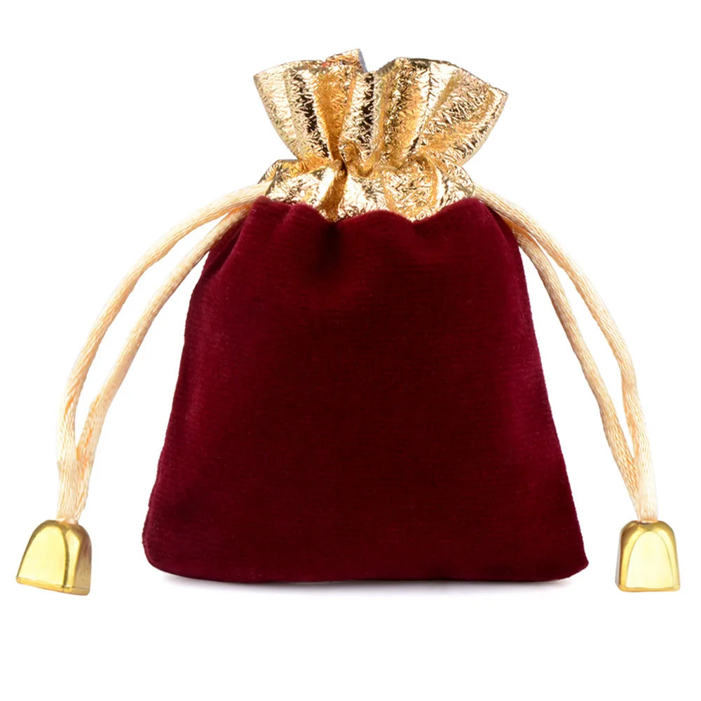 Sacchetto regalo con coulisse in velluto con finiture color oro per matrimonio