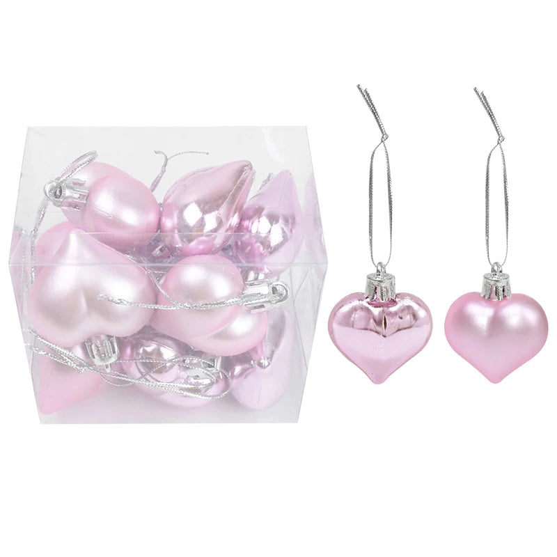 Palline di Natale decorative in plastica color rosa, oro e colori assortiti, confezionate in scatola.