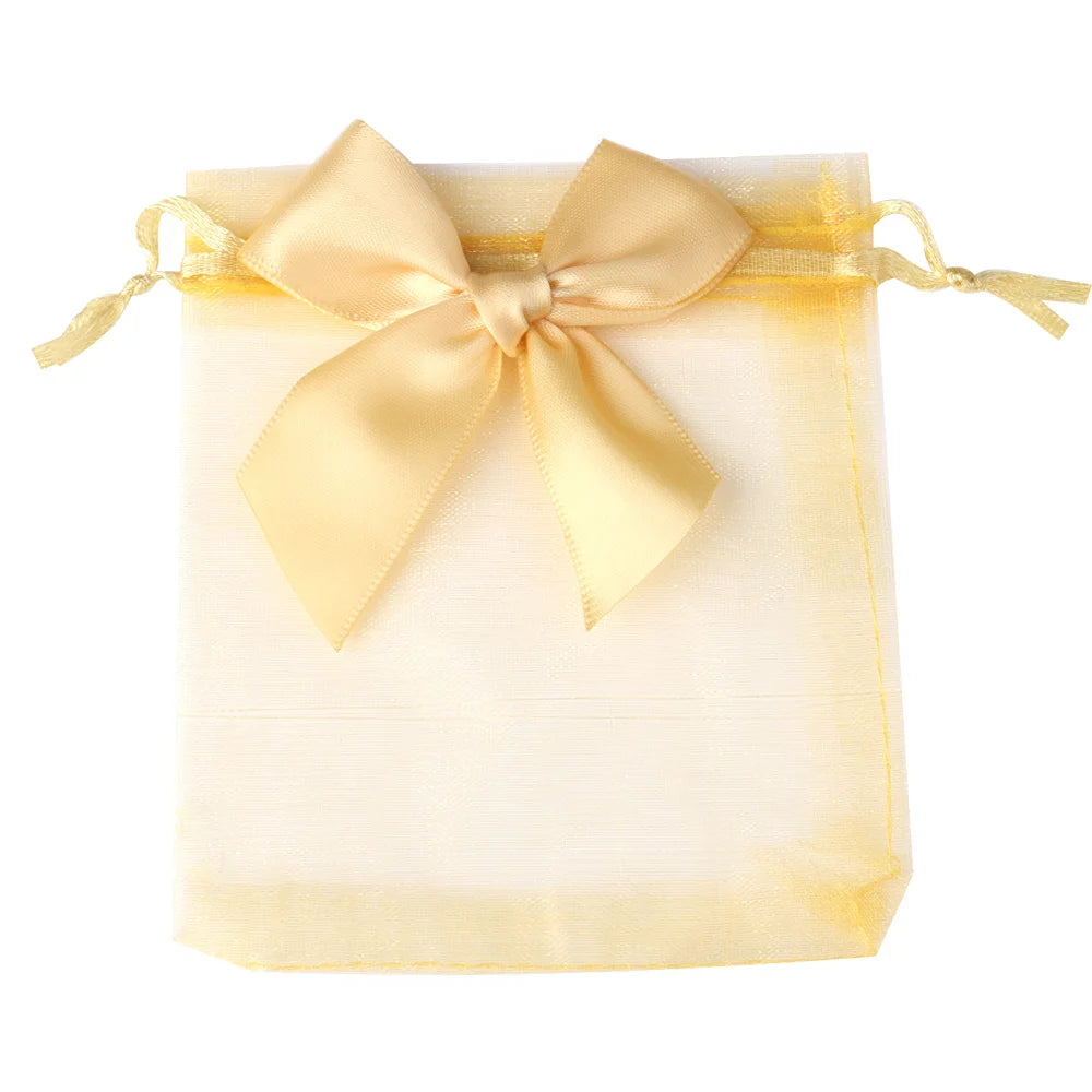 Sacchetto regalo in organza con coulisse e fiocco.