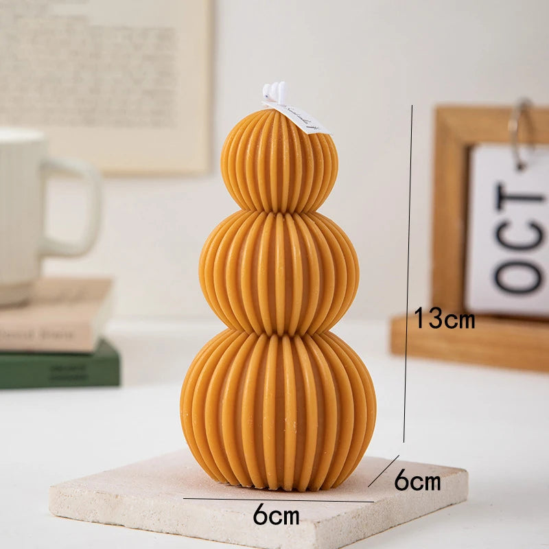 Kreativer Duftkerzenduft mit geometrischem Wellenball.