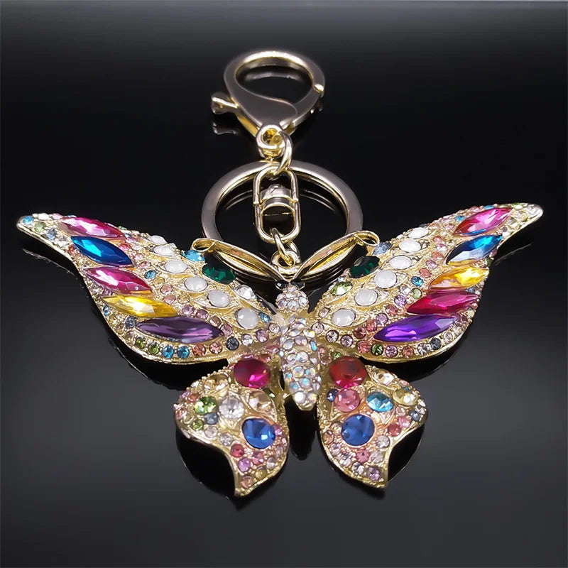 Bunter Schlüsselanhänger mit Strasssteinen und Schmetterlingen in Goldfarbe