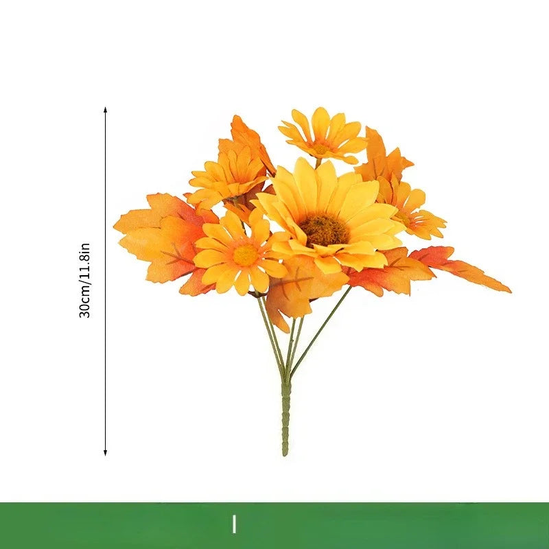 Weihnachtlicher Orangenstrauß mit künstlichen Sonnenblumen und Ahornblättern