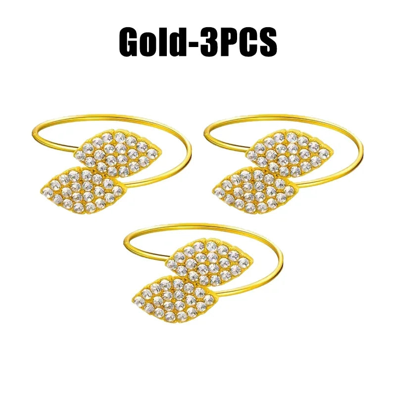 Anillos de servilleta con hojas, elegante decoración de mesa con hojas doradas y plateadas.