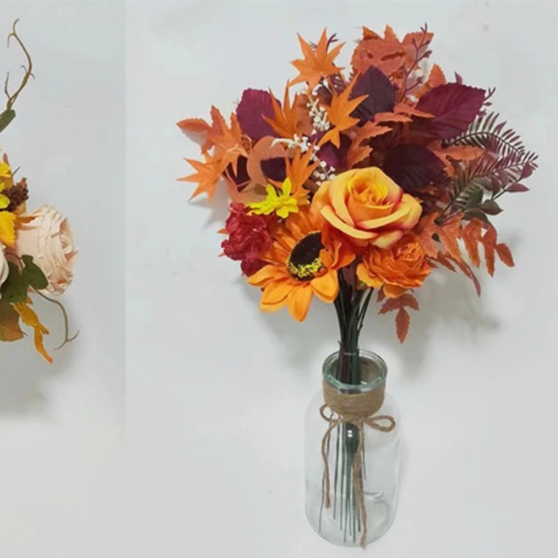 Weihnachtlicher Orangenstrauß mit künstlichen Sonnenblumen und Ahornblättern