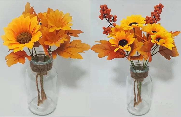 Weihnachtlicher Orangenstrauß mit künstlichen Sonnenblumen und Ahornblättern