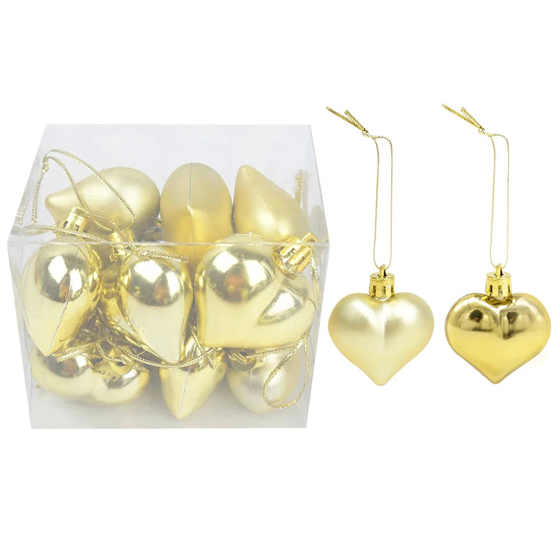 Palline di Natale decorative in plastica color rosa, oro e colori assortiti, confezionate in scatola.