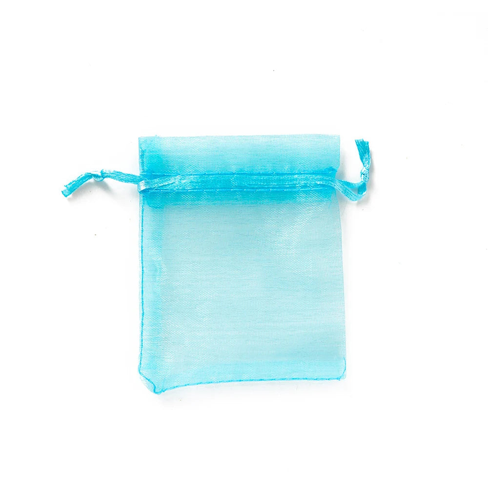 Sacchetti regalo con coulisse color oro e colorati per eventi.