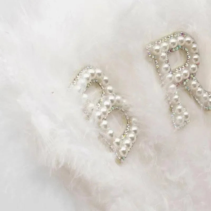 Elegante ventaglio di piume di perle per la sposa