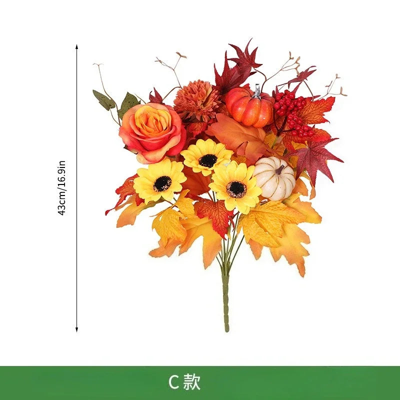 Weihnachtlicher Orangenstrauß mit künstlichen Sonnenblumen und Ahornblättern