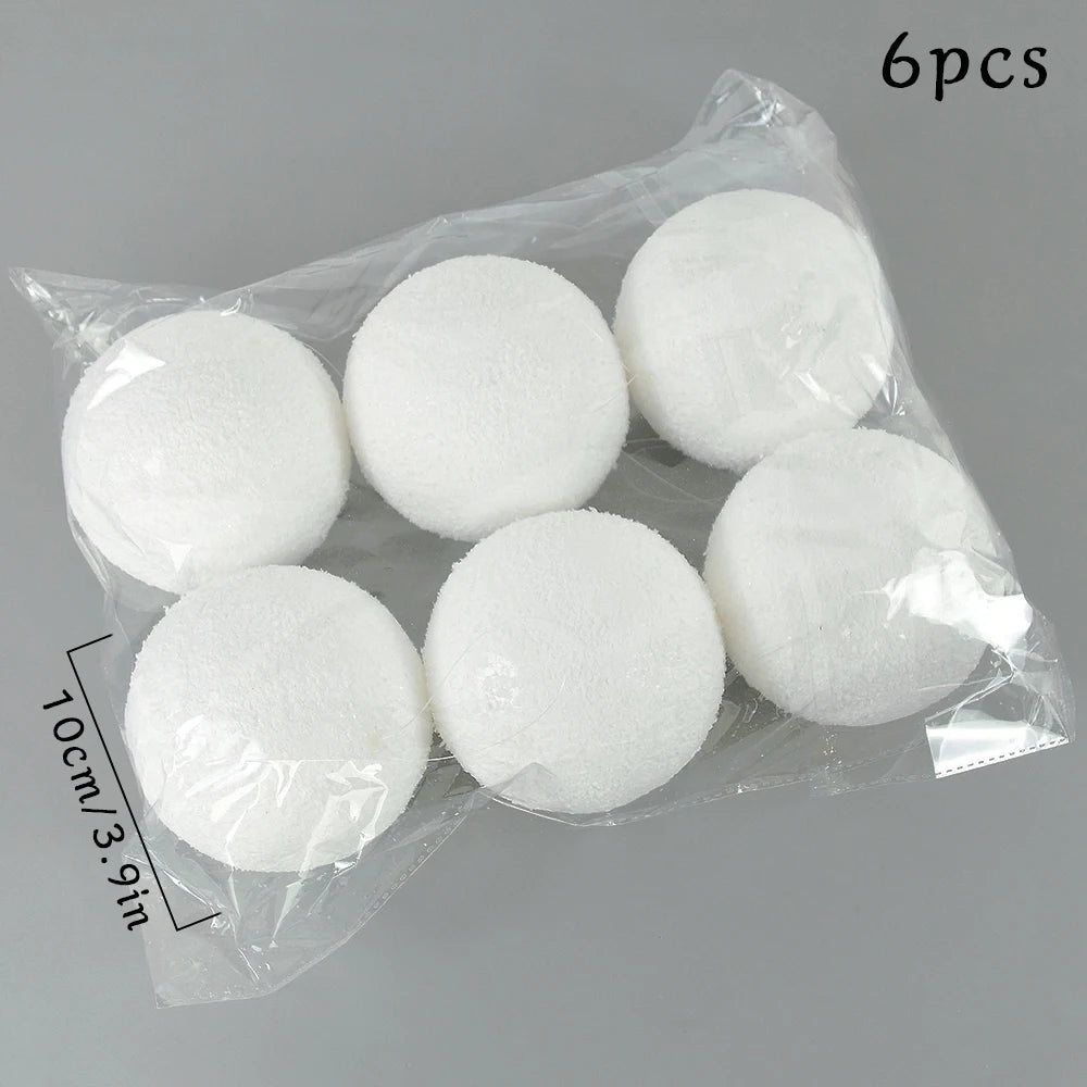 Palline di Natale decorative in plastica color rosa, oro e colori assortiti, confezionate in scatola.