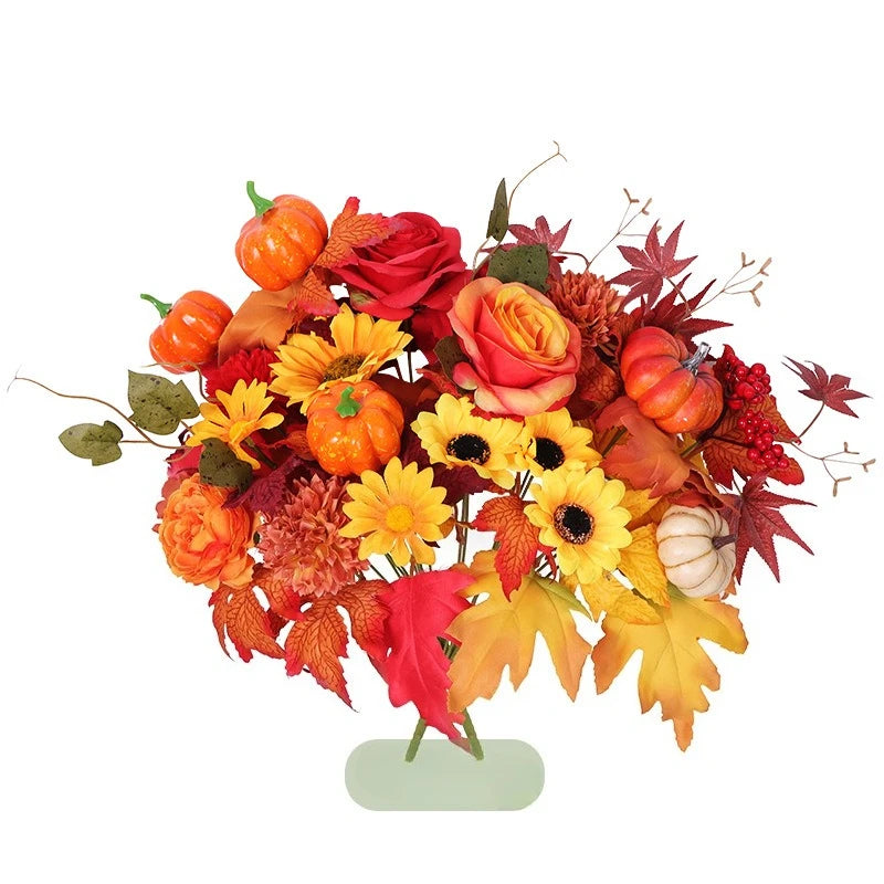 Weihnachtlicher Orangenstrauß mit künstlichen Sonnenblumen und Ahornblättern