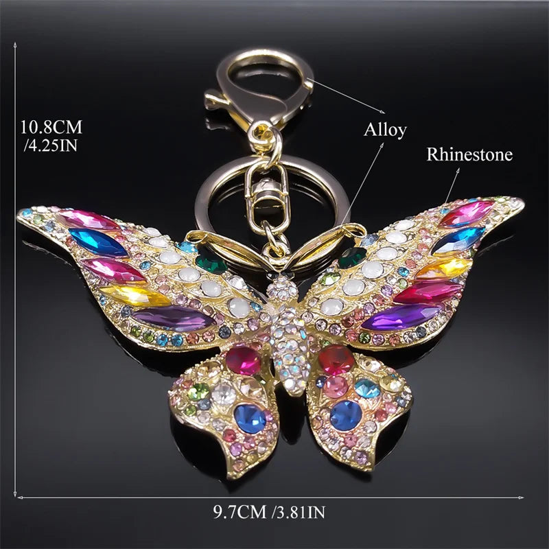 Bunter Schlüsselanhänger mit Strasssteinen und Schmetterlingen in Goldfarbe