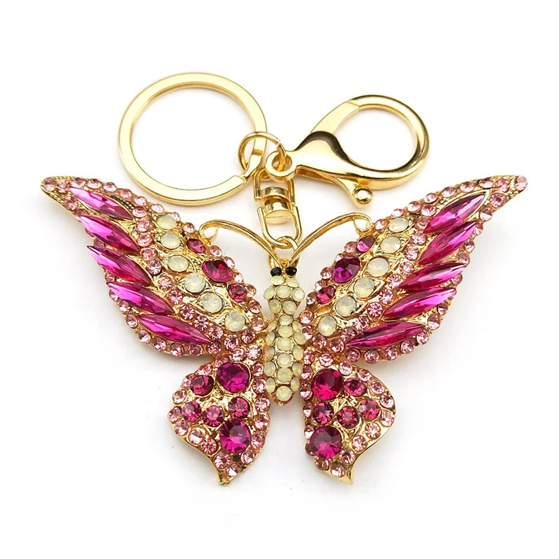 Bunter Schlüsselanhänger mit Strasssteinen und Schmetterlingen in Goldfarbe