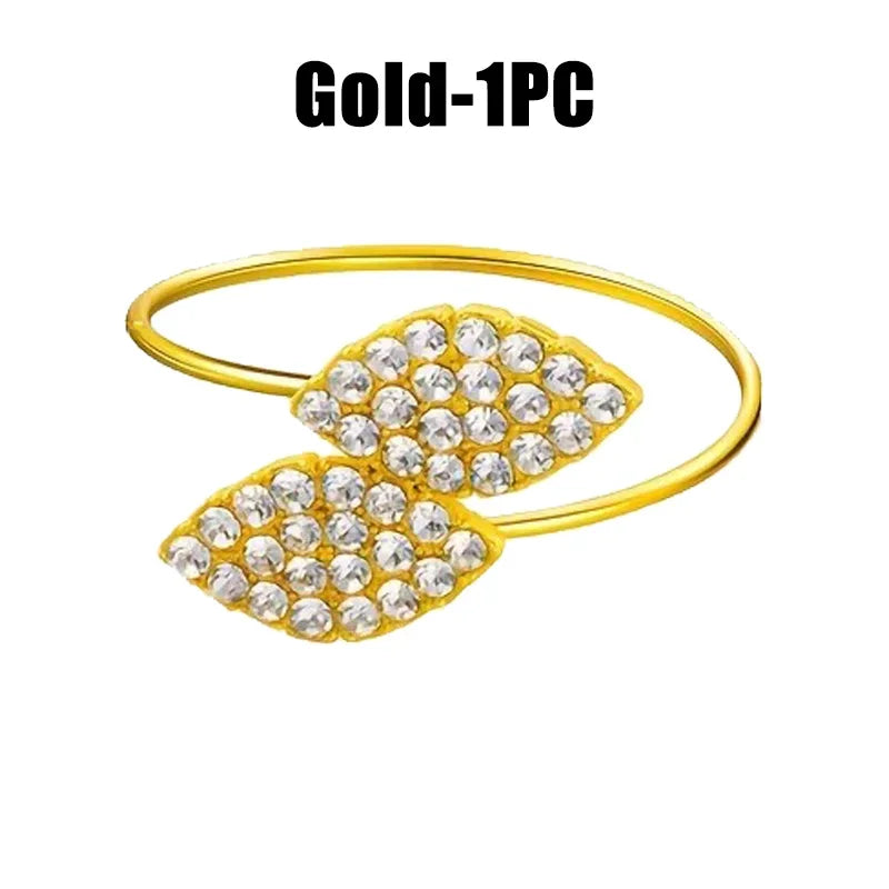 Anillos de servilleta con hojas, elegante decoración de mesa con hojas doradas y plateadas.