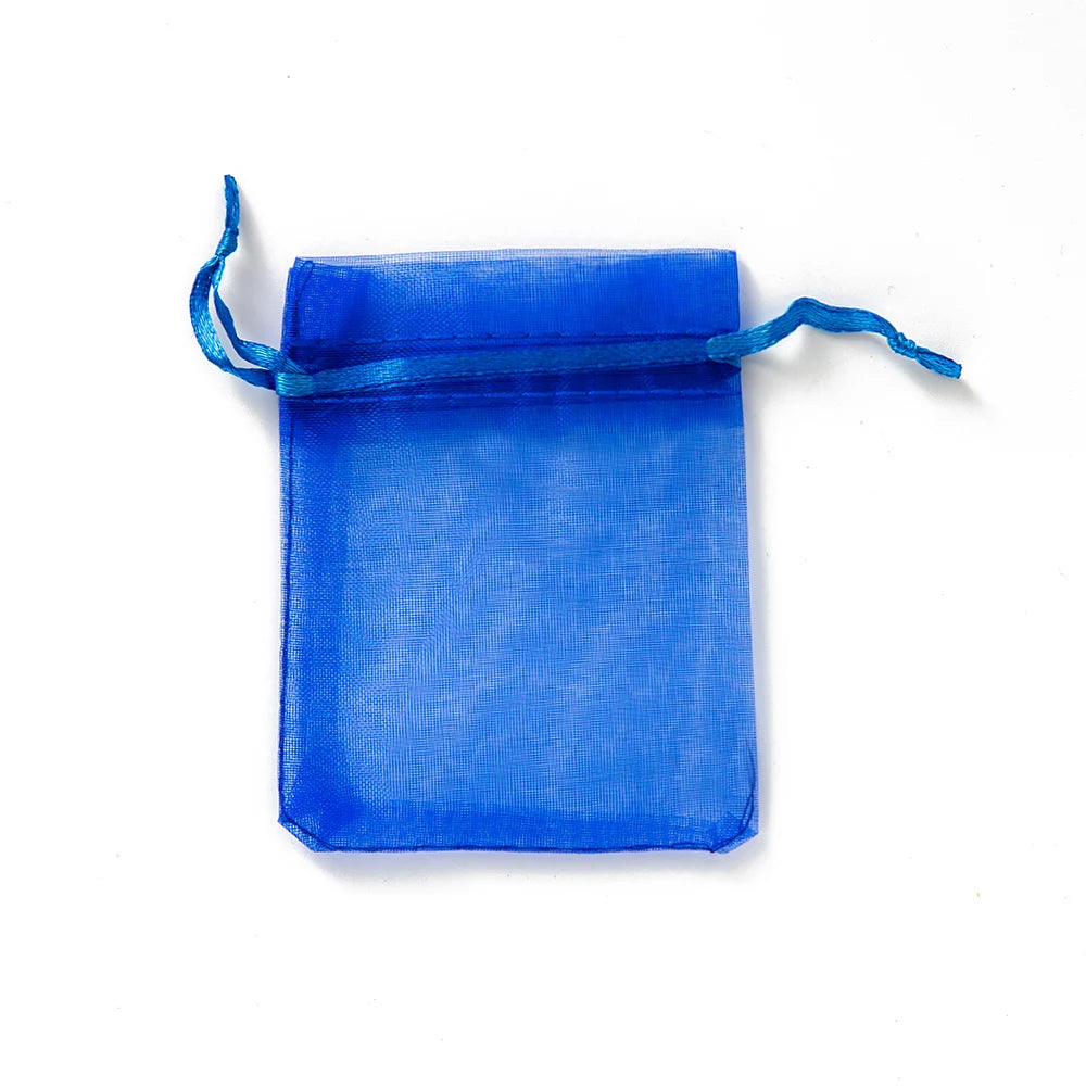 Sacchetti regalo con coulisse color oro e colorati per eventi.