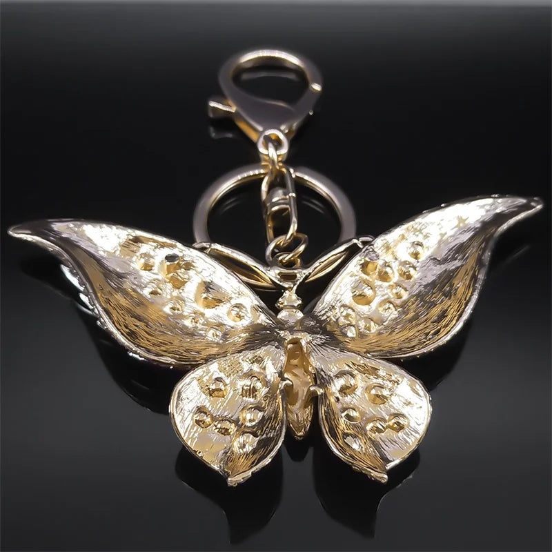 Bunter Schlüsselanhänger mit Strasssteinen und Schmetterlingen in Goldfarbe