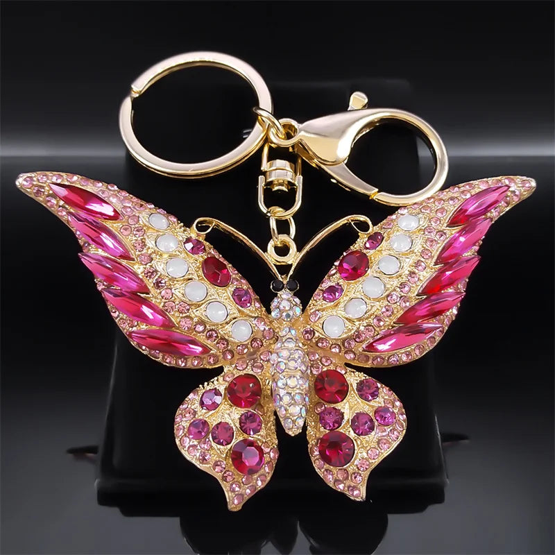 Bunter Schlüsselanhänger mit Strasssteinen und Schmetterlingen in Goldfarbe