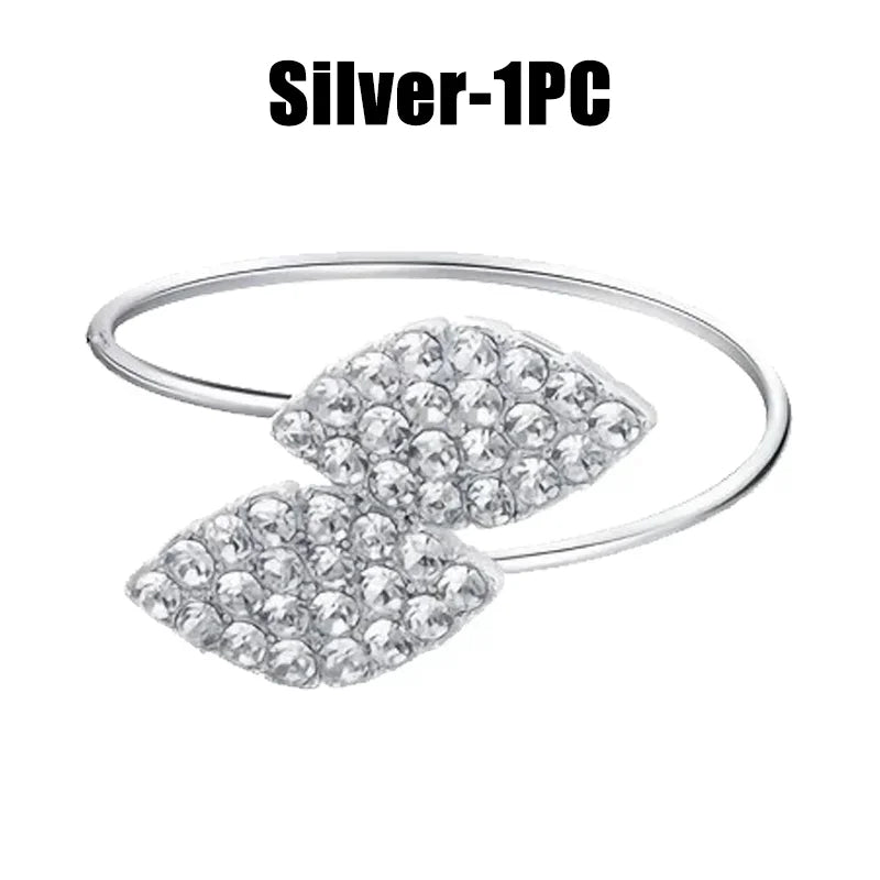 Anillos de servilleta con hojas, elegante decoración de mesa con hojas doradas y plateadas.