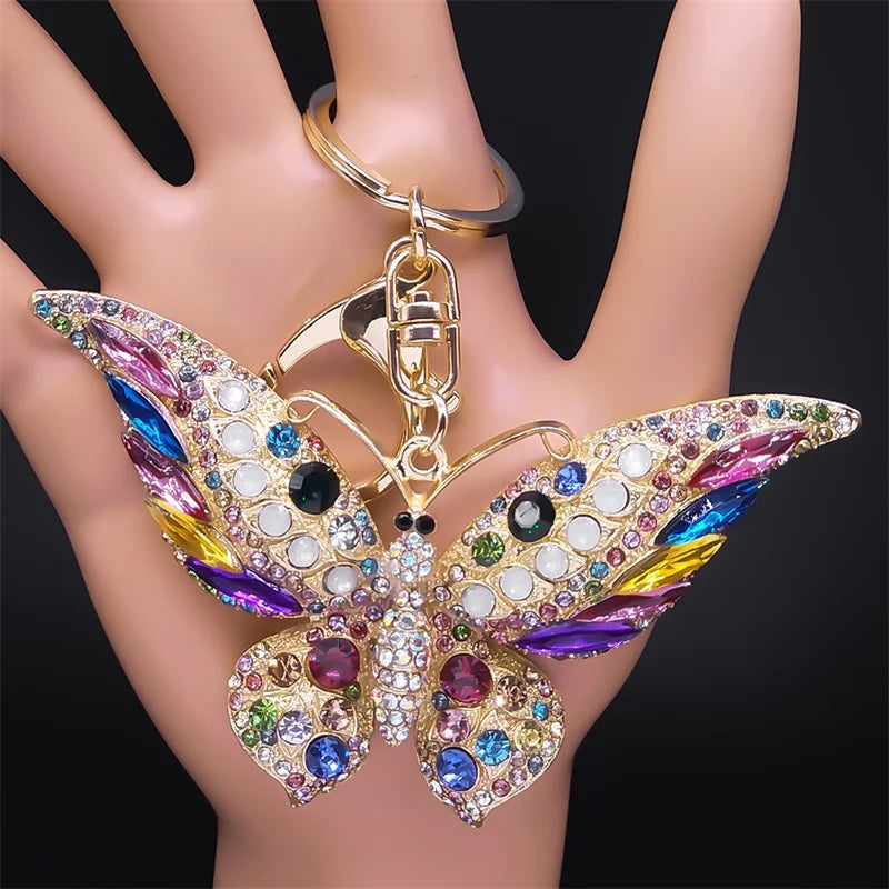 Bunter Schlüsselanhänger mit Strasssteinen und Schmetterlingen in Goldfarbe