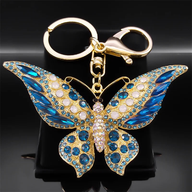 Bunter Schlüsselanhänger mit Strasssteinen und Schmetterlingen in Goldfarbe