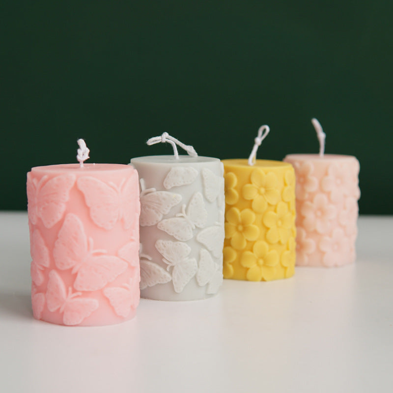 Zylindrische Kerzenform mit Pflaumenblüten- oder Schmetterlingsprägung