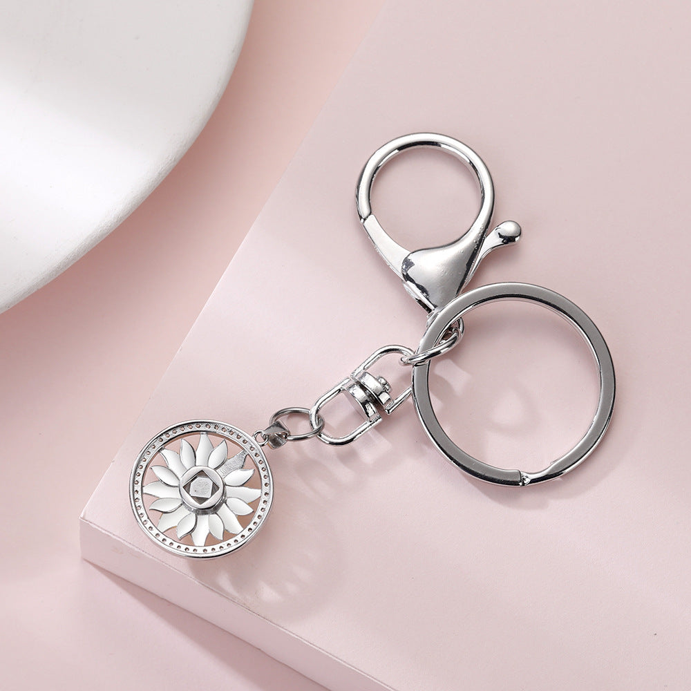 Portachiavi con proiezione fotografica Daisy